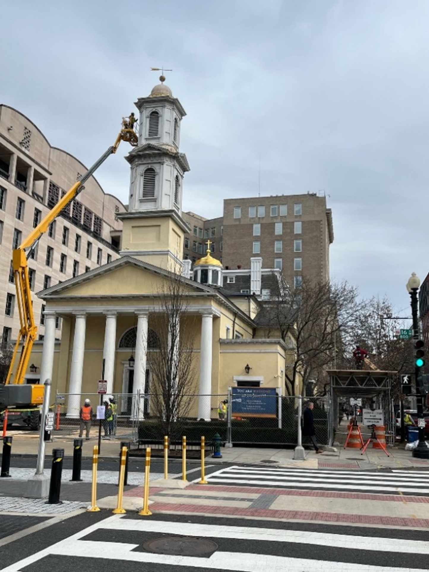 Exterior image of a building with a center bell tower.