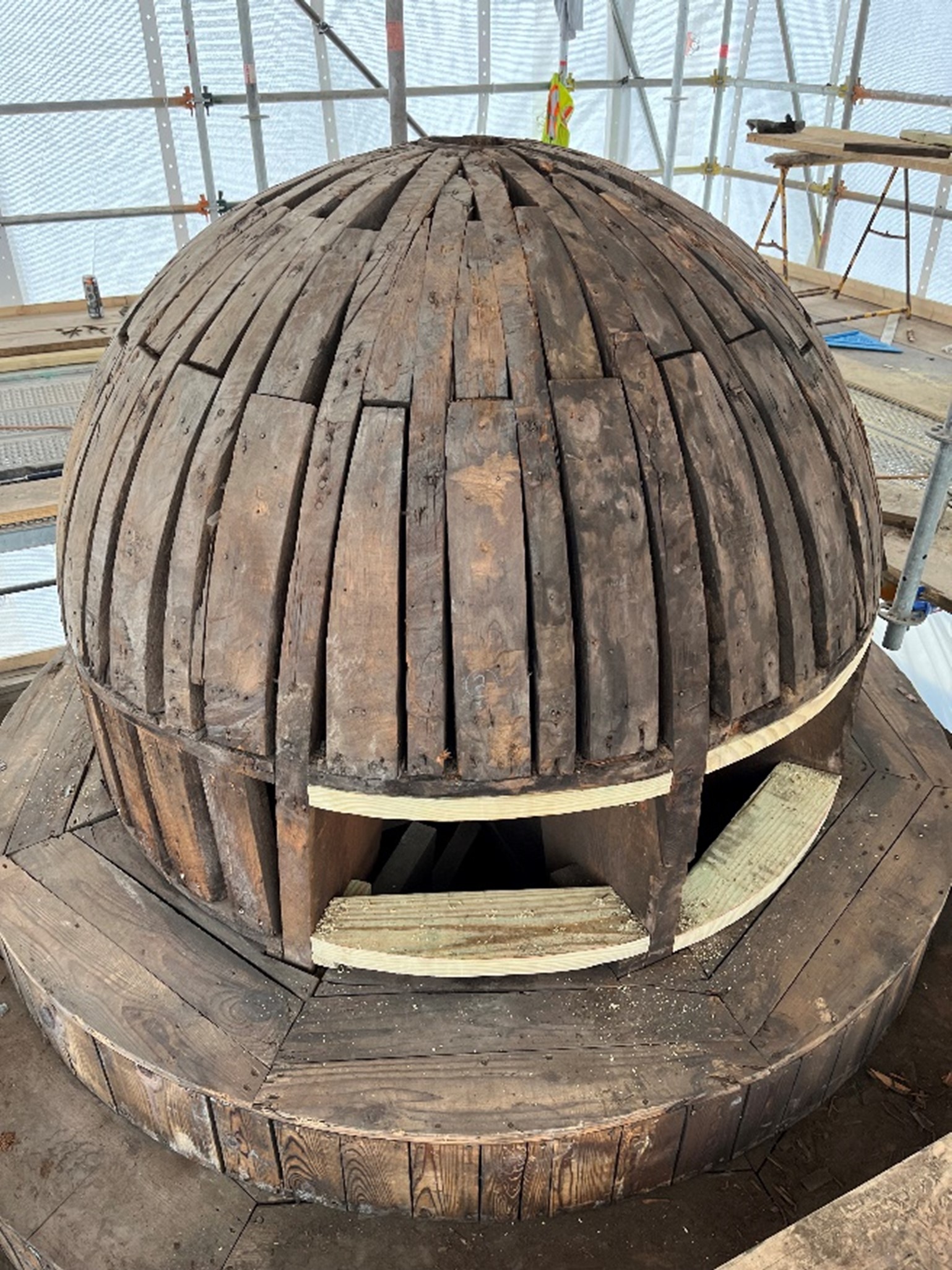 Tower dome surrounded by scaffolding.