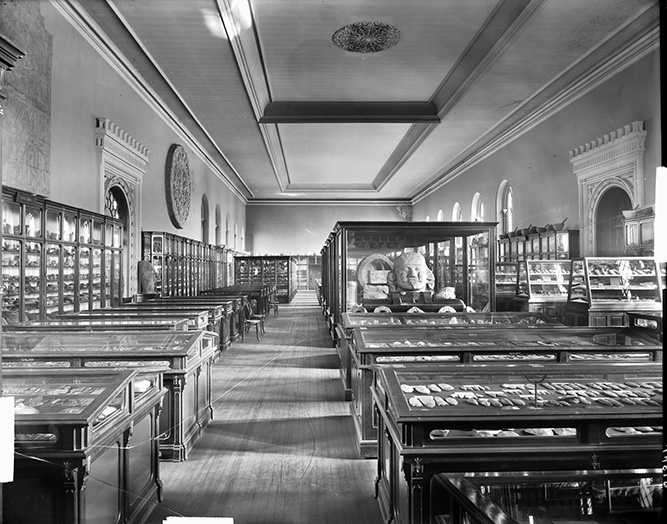 Black and white image of the exhibition in the Upper Great Hall, c. 1885. Note the central tray ceiling detail with a north-south division.