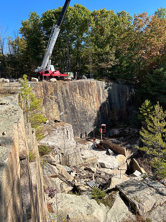 Image of crane on the Swenson Pink granite quarry.